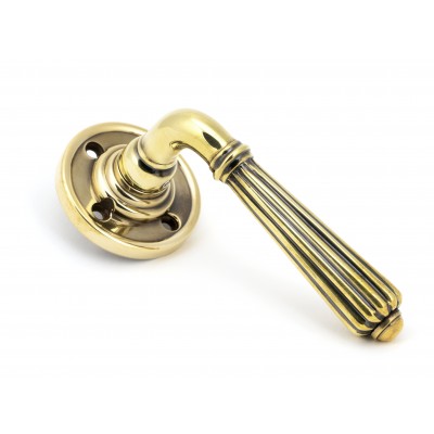 From The Anvil - Aged Brass Hinton Lever on Rose Set 45309