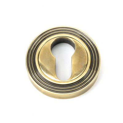 From The Anvil - Aged Brass Round Euro Escutcheon (Beehive) 45709