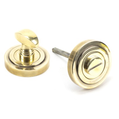 From The Anvil - Aged Brass Round Thumbturn Set (Art Deco) 45732