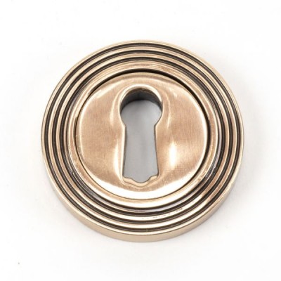 From The Anvil - Polished Bronze Round Escutcheon (Beehive) 46119