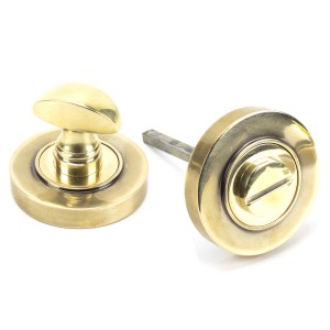 From The Anvil - Aged Brass Round Thumbturn Set (Plain) 45731