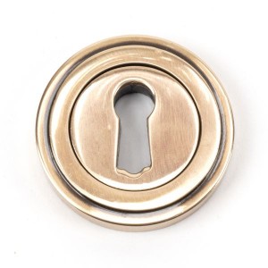 From The Anvil - Polished Bronze Round Escutcheon (Art Deco) 46118