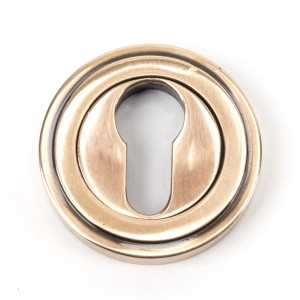 From The Anvil - Polished Bronze Round Euro Escutcheon (Art Deco) 46126