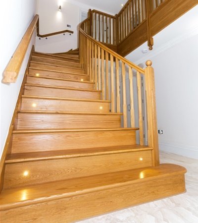 Curved oak staircase by Pear Stairs