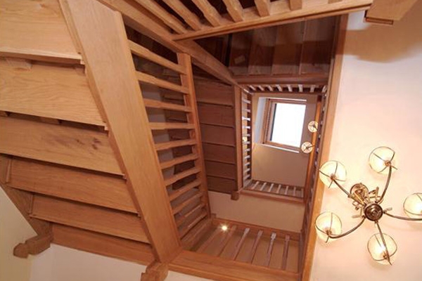 Oak stair case with winder stairs for a multi storey house. Grand oak stairs 