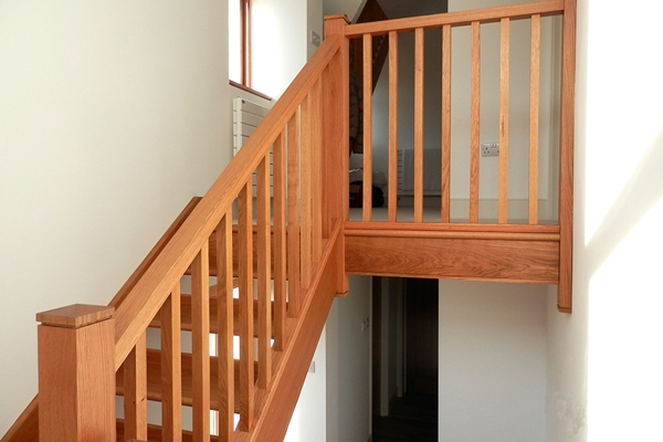 Plain, simple spindles with a simple timber handrail