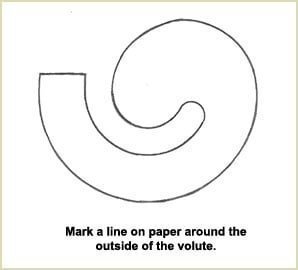 Mark a line on paper around the outside of the volute.