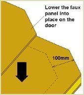lower the faux panel into place on door